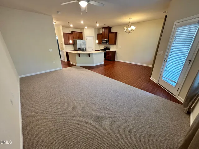 a view of a backyard of the house