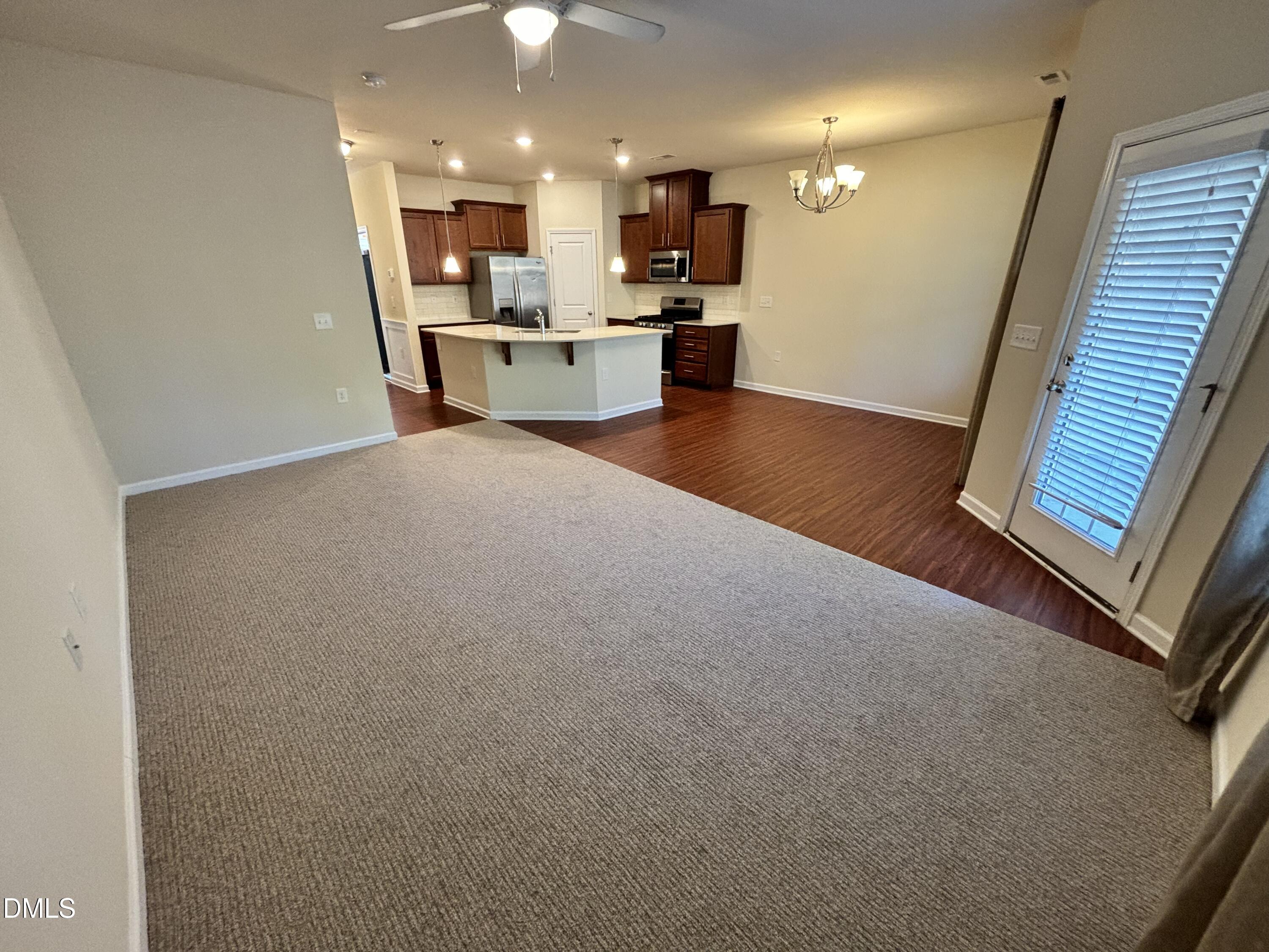 1005 Epiphany Road Morrisville, NC 27560 - Photo 7 of 21 a view of a kitchen and dining room