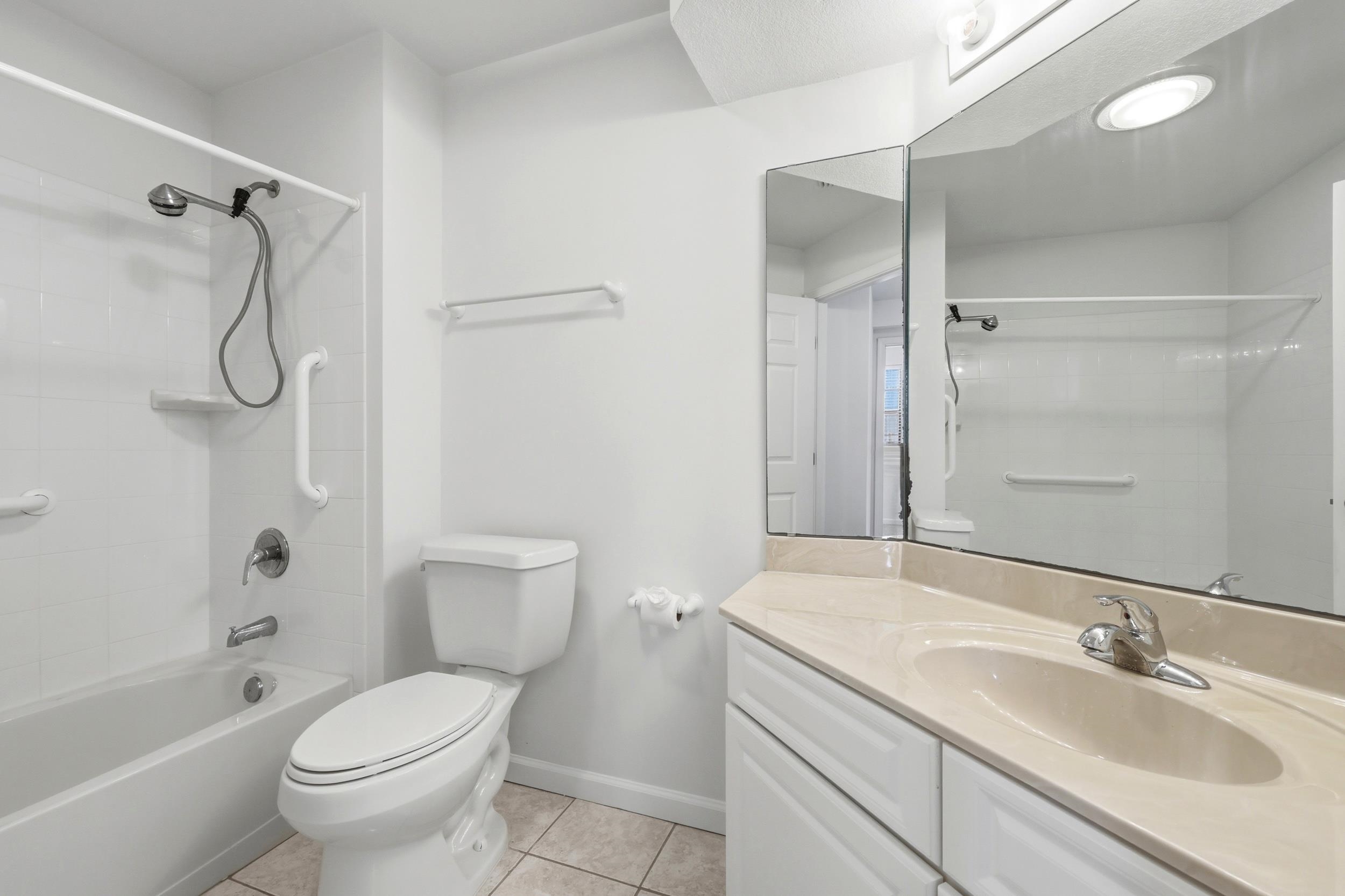 2500 Vista Cove Road St. Augustine, FL 32084 - Photo 37 of 53 a bathroom with a granite countertop sink toilet and shower