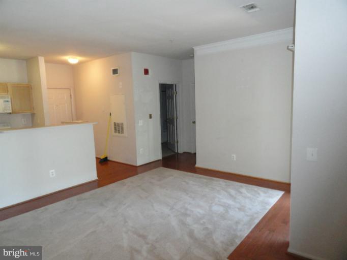 1600 Spring Gate Dr., Unit 2113 McLean, VA 22102 - Photo 3 of 6 a view of an empty room