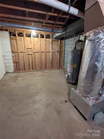 a view of a chair and table on the garden