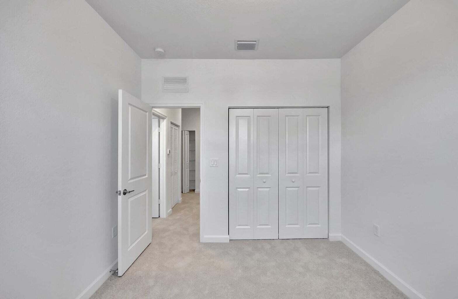 29190 Southwest 163rd Court Homestead, FL 33033 - Photo 11 of 15 an empty room with closet area