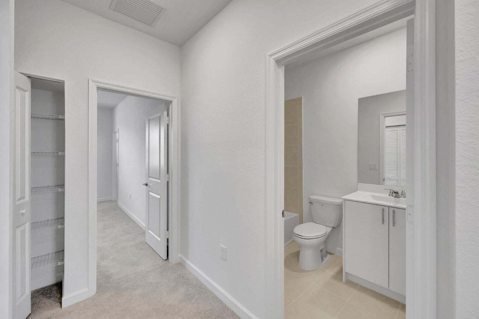 29190 Southwest 163rd Court Homestead, FL 33033 - Photo 13 of 15 a bathroom with a toilet sink and shower
