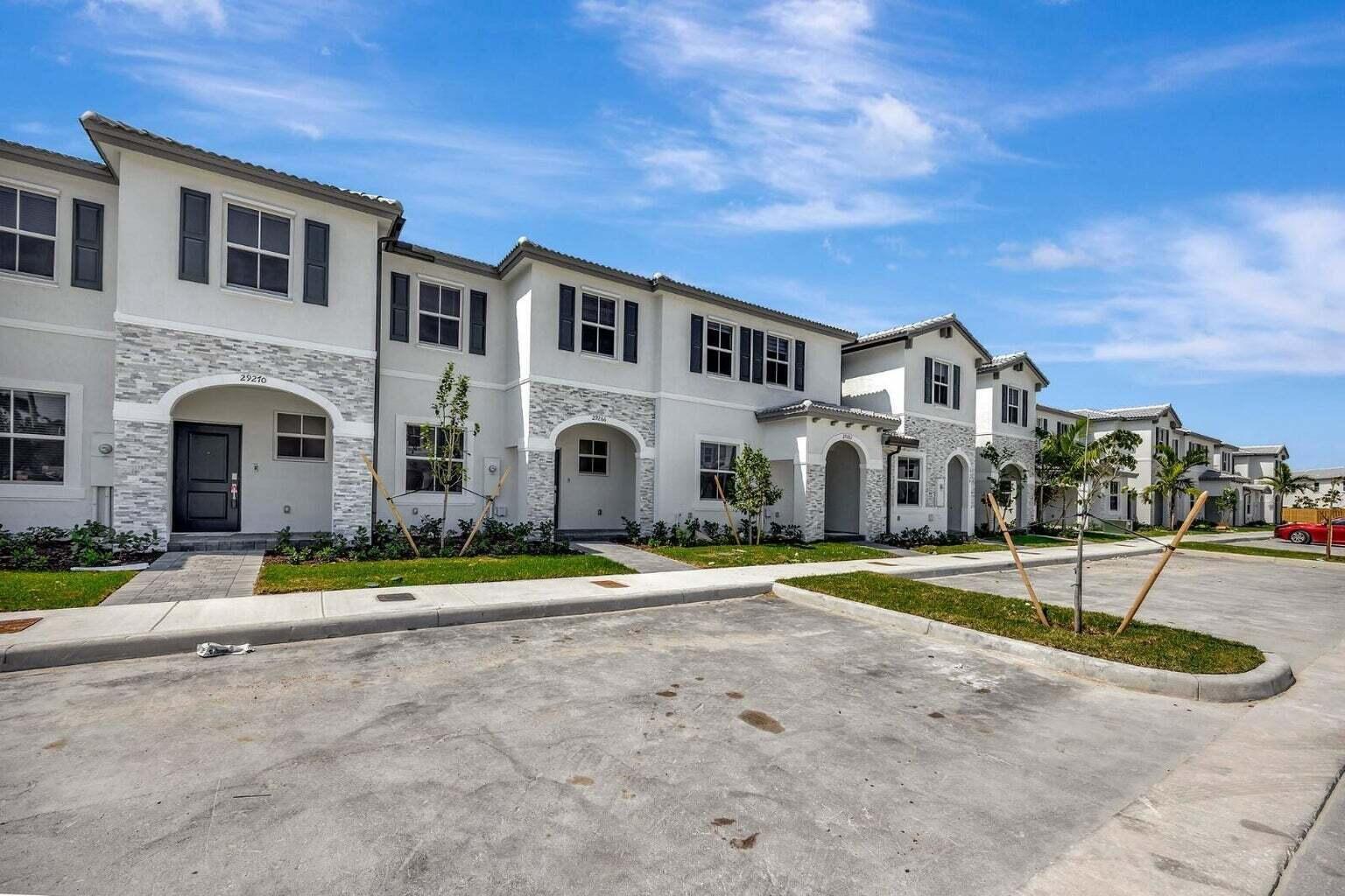 29190 Southwest 163rd Court Homestead, FL 33033 - Photo 15 of 15 a view of an house with backyard and swimming pool