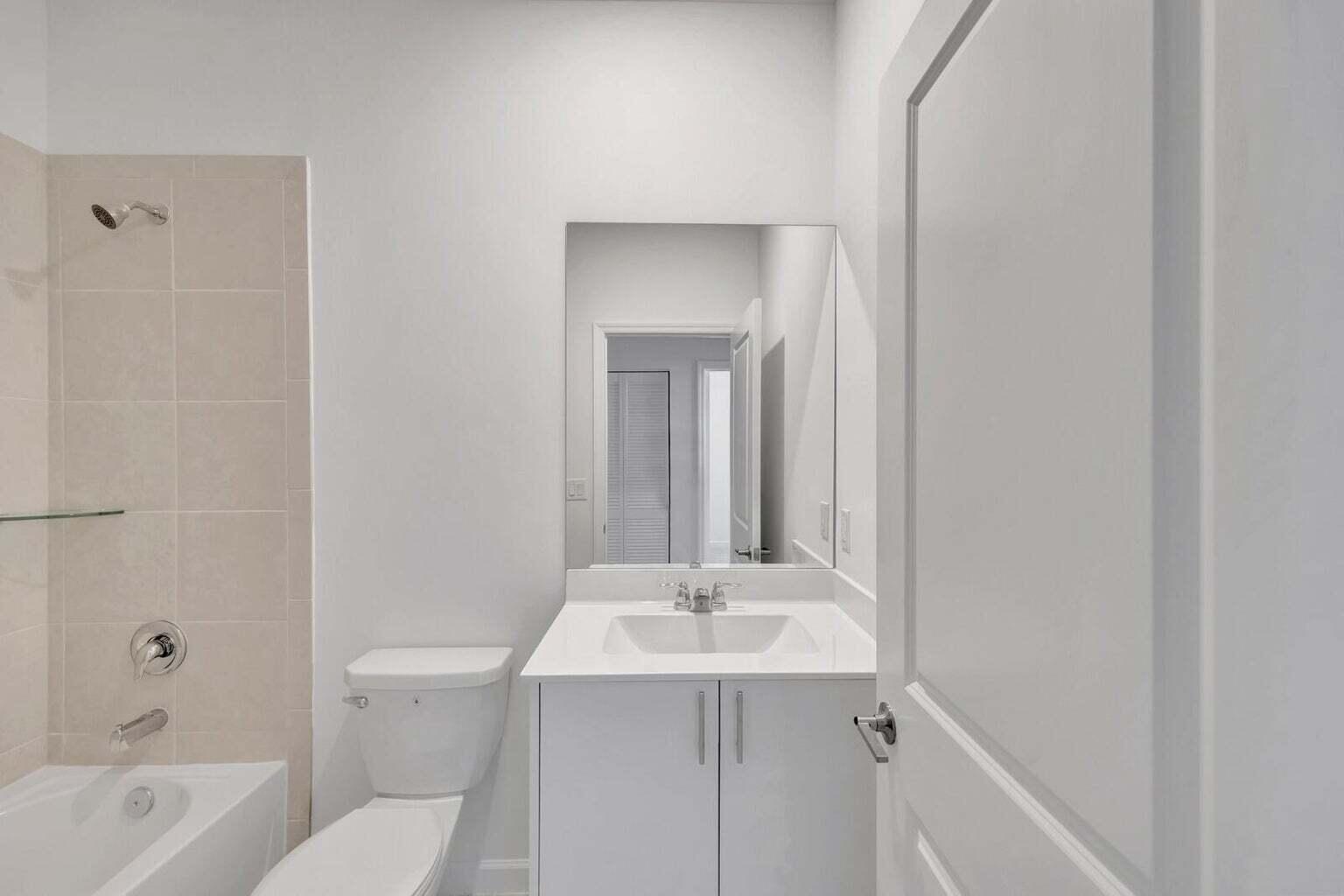 29190 Southwest 163rd Court Homestead, FL 33033 - Photo 9 of 15 a bathroom with a sink a toilet and shower