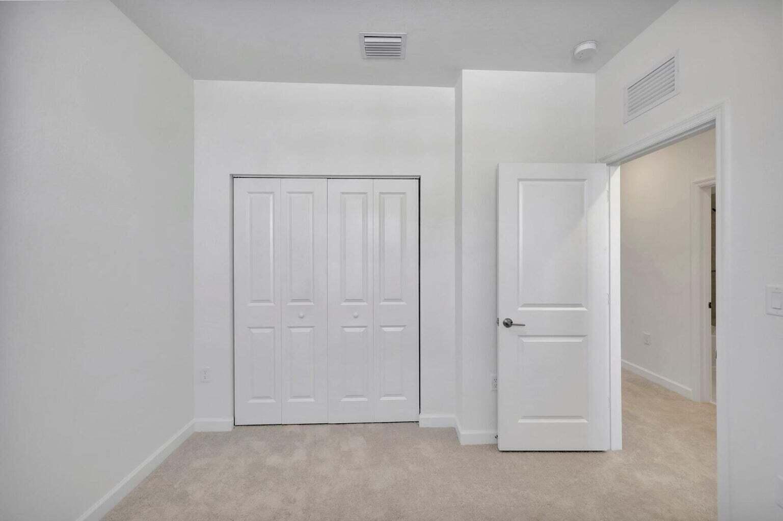 29190 Southwest 163rd Court Homestead, FL 33033 - Photo 10 of 15 an empty room with closet area