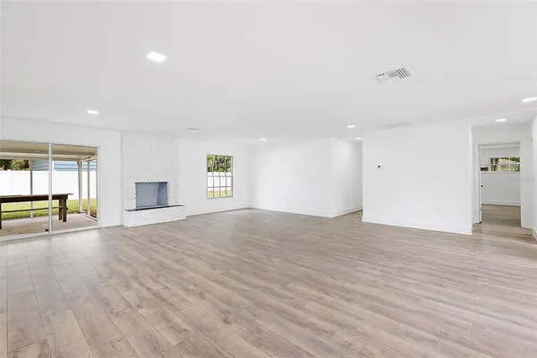 a view of a kitchen with a sink and a window