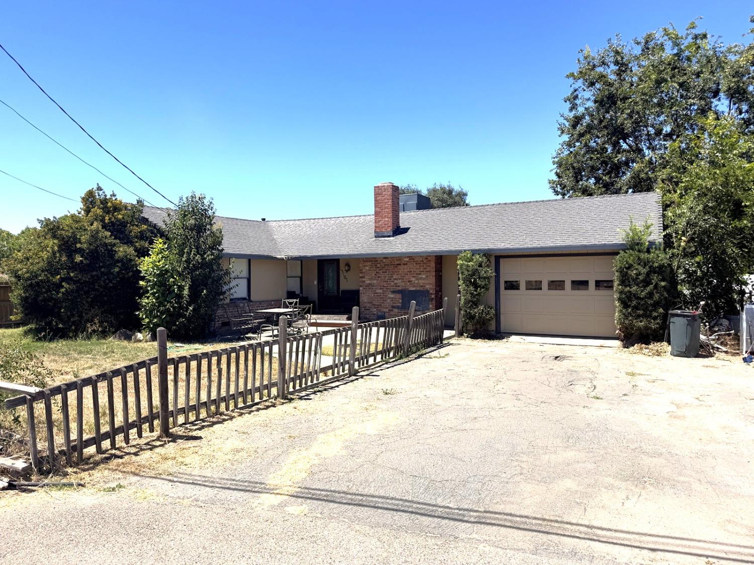 13107 Locke Road Lockeford, CA 95237 - Photo 1 of 1 Simple and appealing ranch style home surrounded by nature.