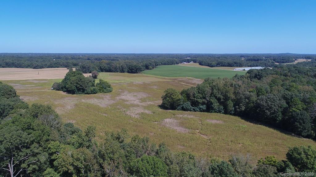 2030 New Salem Road, Unit 3 Monroe, NC 28110 - Photo 4 of 8 an aerial view of a houses with a yard