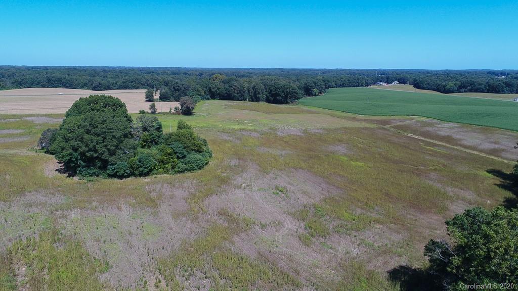 2030 New Salem Road, Unit 3 Monroe, NC 28110 - Photo 5 of 8 an aerial view of a yard with mountain