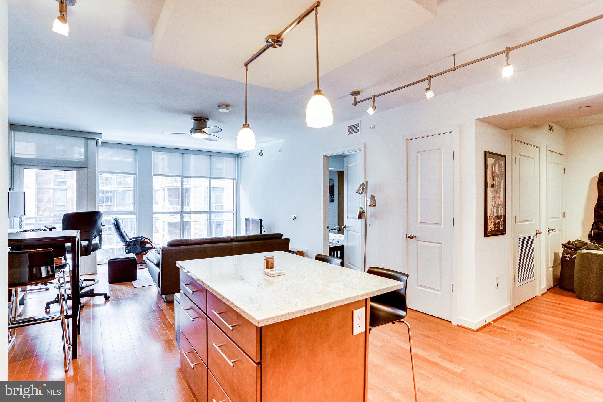 1025 First Street Southeast, Unit 801 Washington, DC 20003 - Photo 12 of 55 Convenient kitchen island w/ seating
