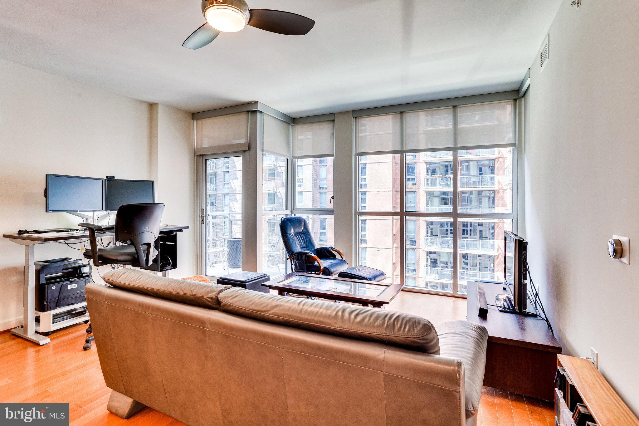 1025 First Street Southeast, Unit 801 Washington, DC 20003 - Photo 14 of 55 Floor-to-ceiling windows in the living room