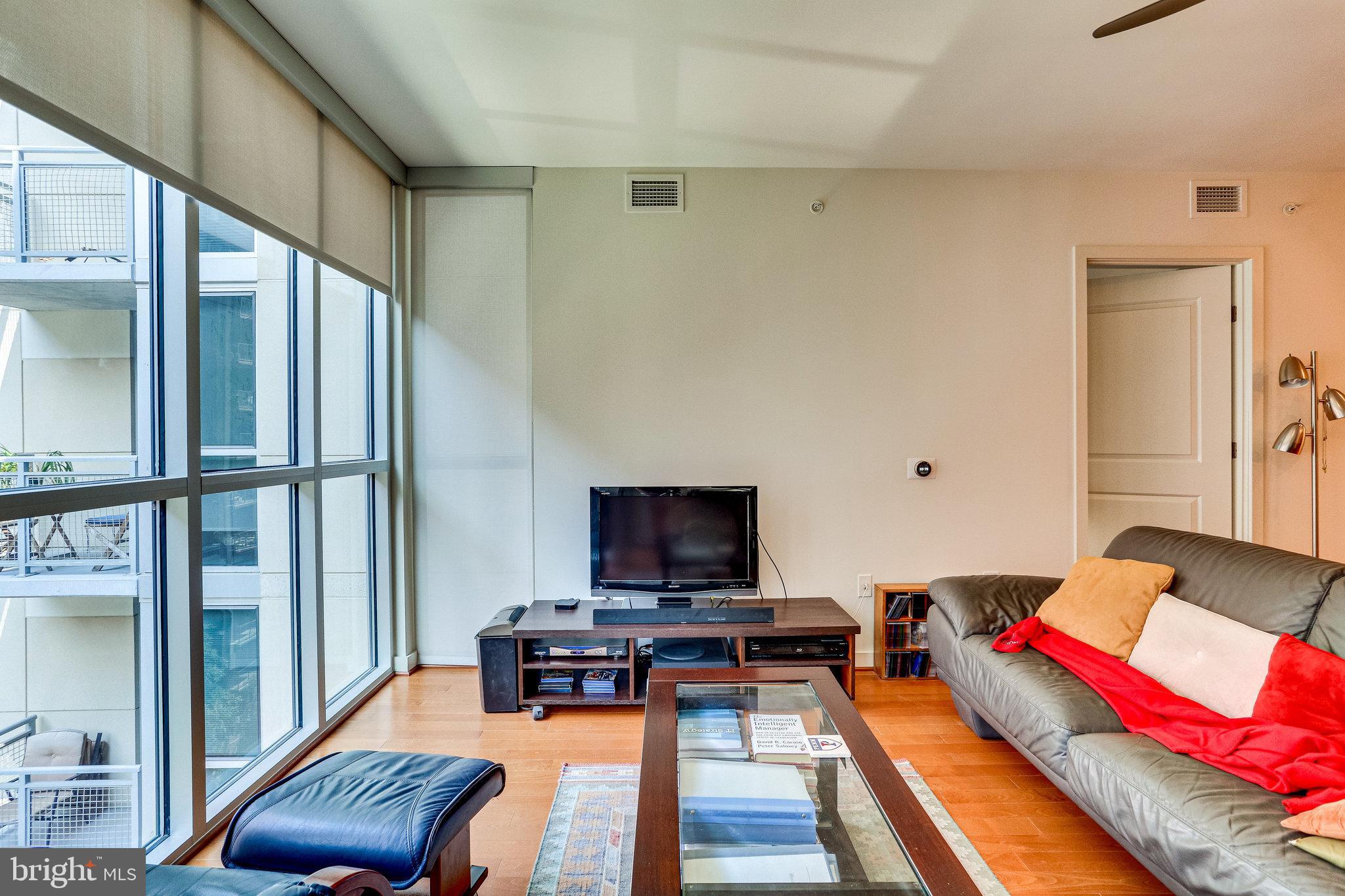 1025 First Street Southeast, Unit 801 Washington, DC 20003 - Photo 16 of 55 Floor-to-ceiling windows in the living room