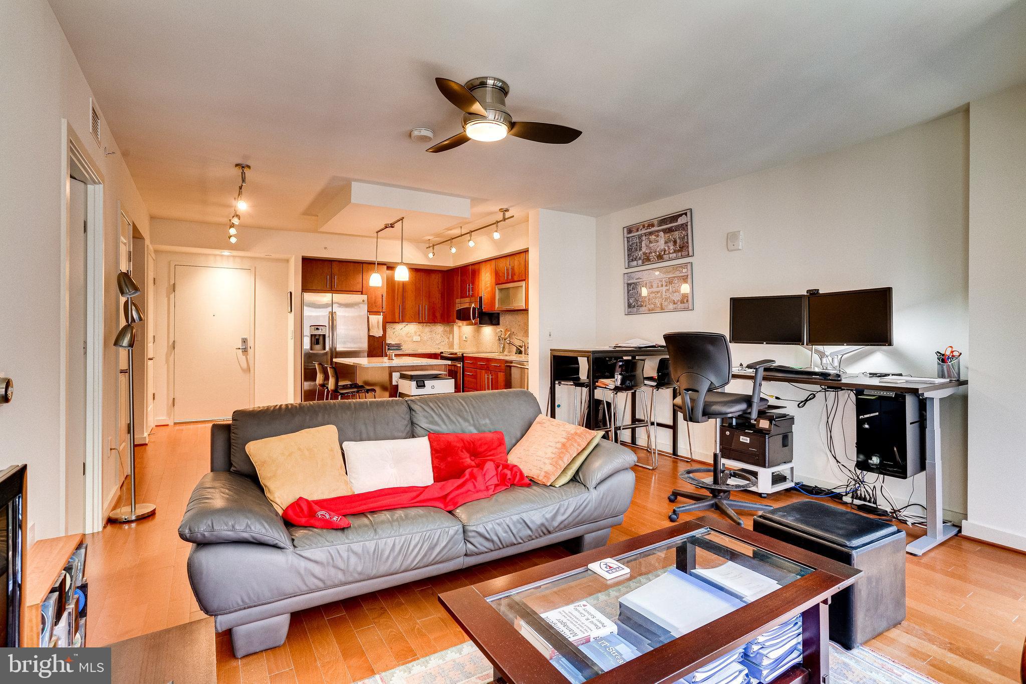 1025 First Street Southeast, Unit 801 Washington, DC 20003 - Photo 17 of 55 Floor-to-ceiling windows in the living room