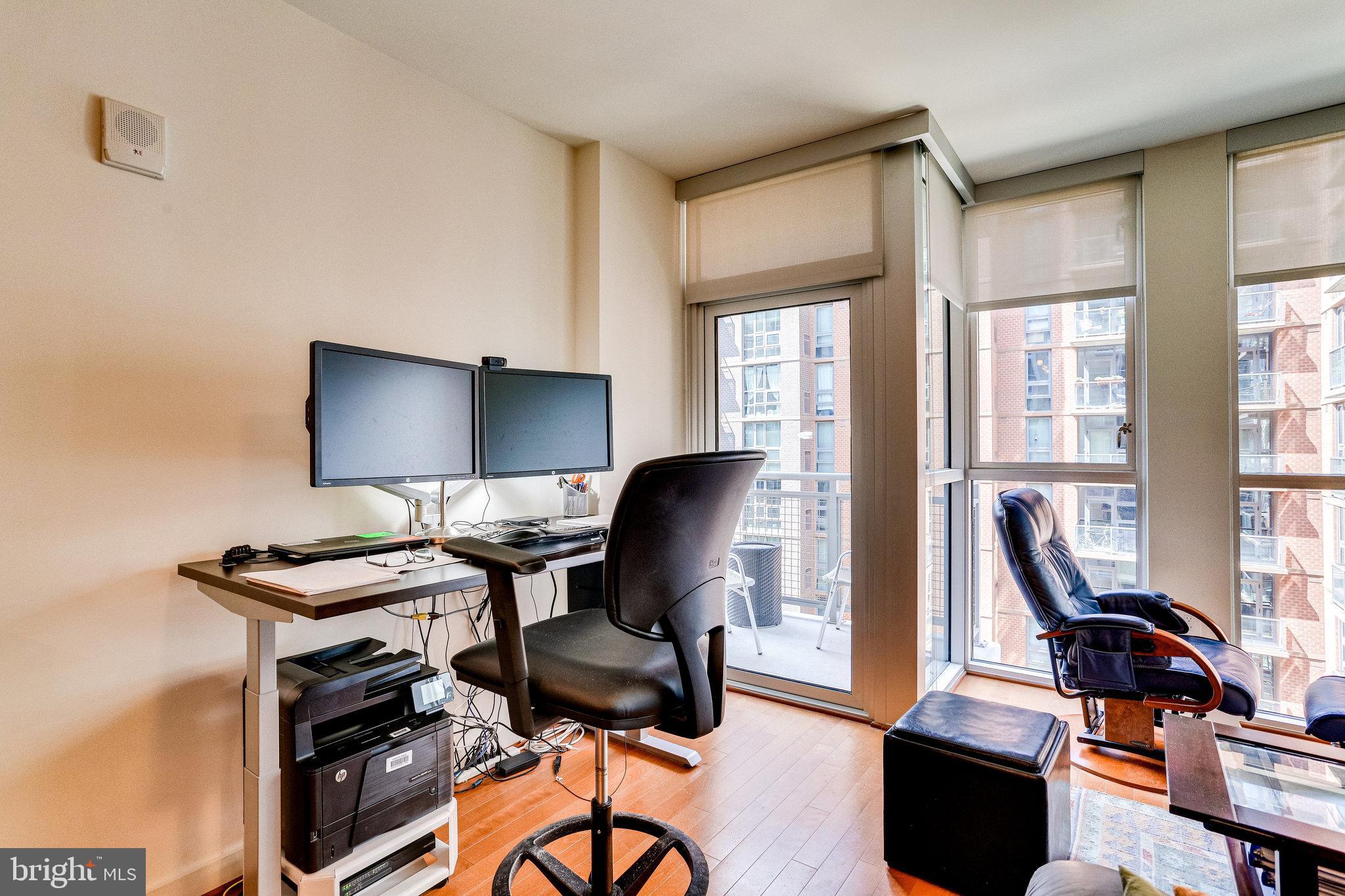 1025 First Street Southeast, Unit 801 Washington, DC 20003 - Photo 18 of 55 Floor-to-ceiling windows in the living room