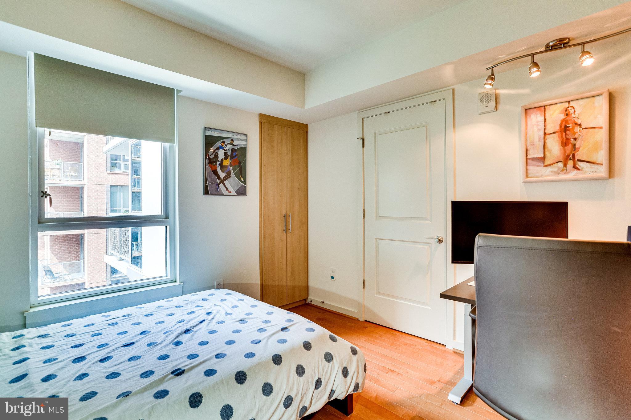 1025 First Street Southeast, Unit 801 Washington, DC 20003 - Photo 21 of 55 Spacious bedroom w/ tons of storage space!