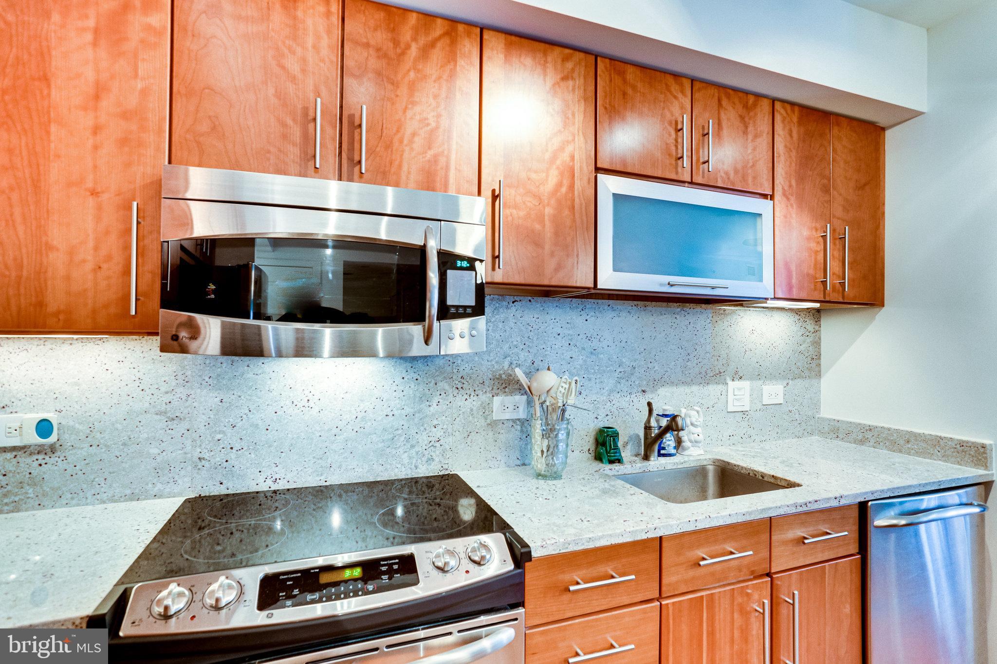 1025 First Street Southeast, Unit 801 Washington, DC 20003 - Photo 10 of 55 High-end kitchen w/ stainless and granite!