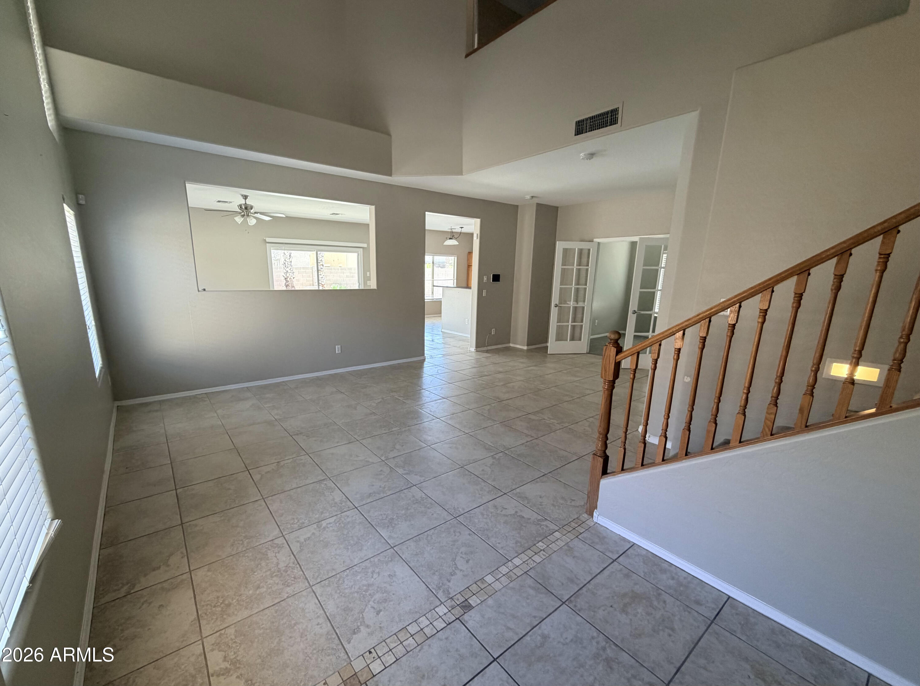191 West Rio Drive Casa Grande, AZ 85122 - Photo 6 of 34 a view of a hallway with staircase
