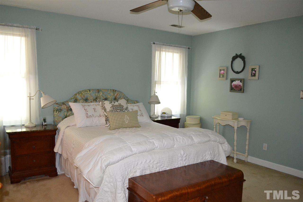 2320 Pastille Lane Raleigh, NC 27612 - Photo 14 of 25 a bedroom with a bed and window