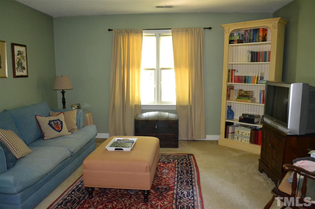2320 Pastille Lane Raleigh, NC 27612 - Photo 20 of 25 a bedroom with a bed furniture and a window