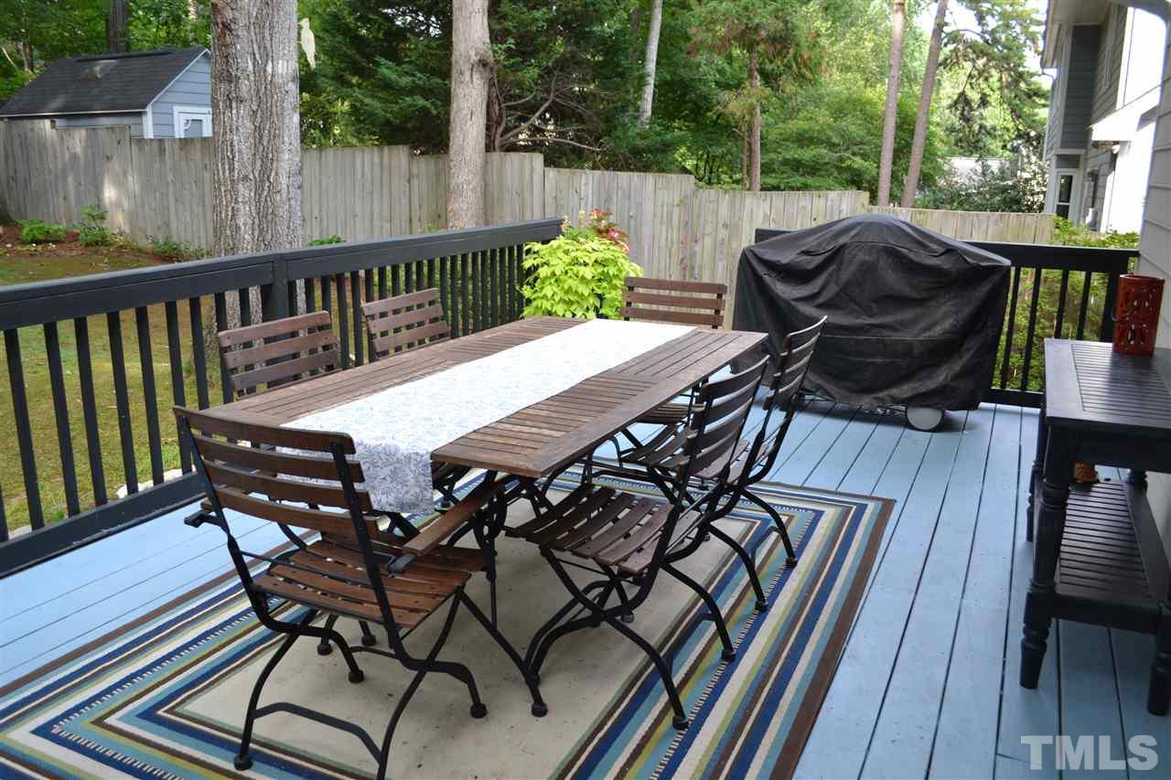 2320 Pastille Lane Raleigh, NC 27612 - Photo 22 of 25 a view of a table and chairs on the roof deck