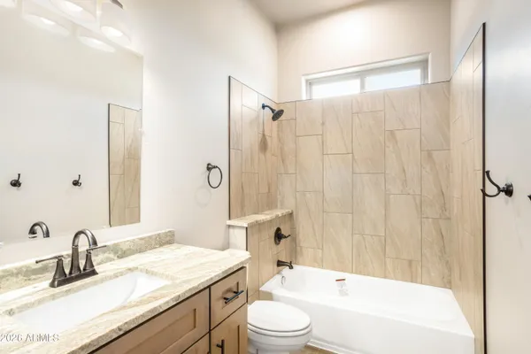 an empty room with wooden floor