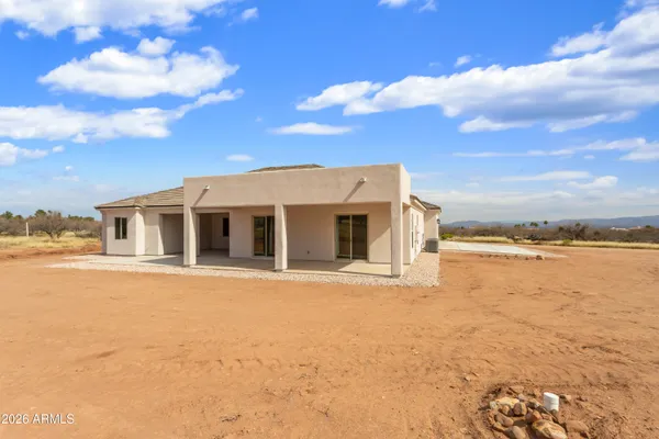 a front view of a house with yard