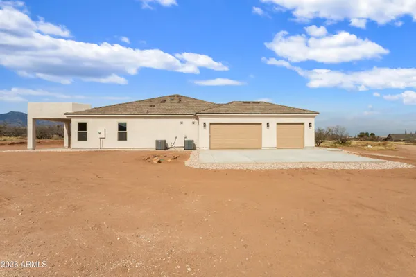 a view of a house with a patio
