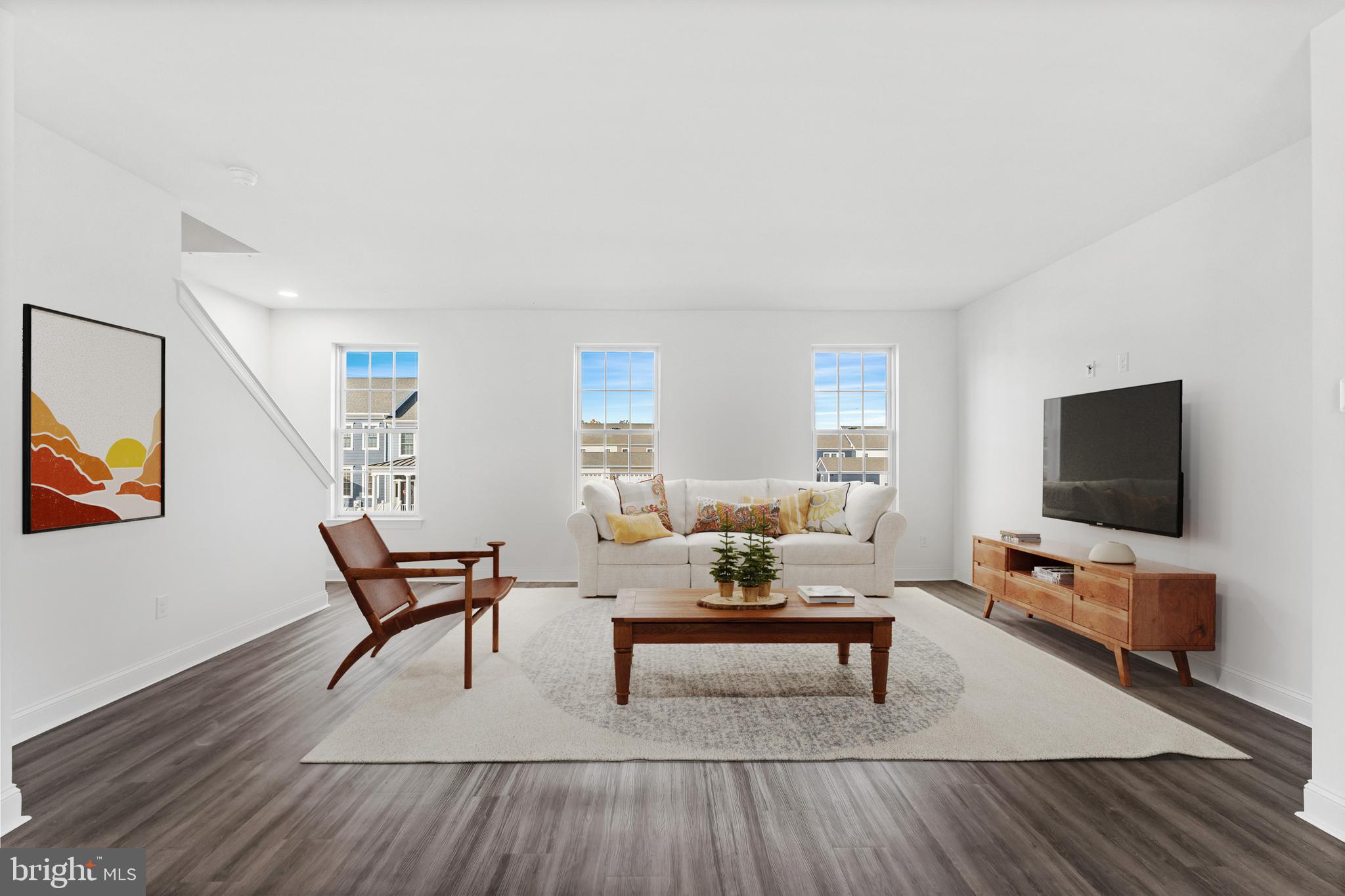 870 Mapleton Avenue Middletown, DE 19709 - Photo 11 of 23 a living room with furniture and a flat screen tv