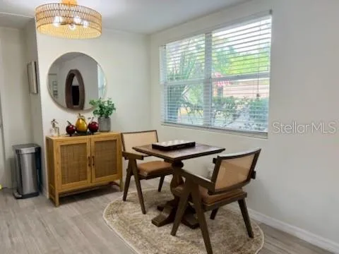 a workspace with furniture and window