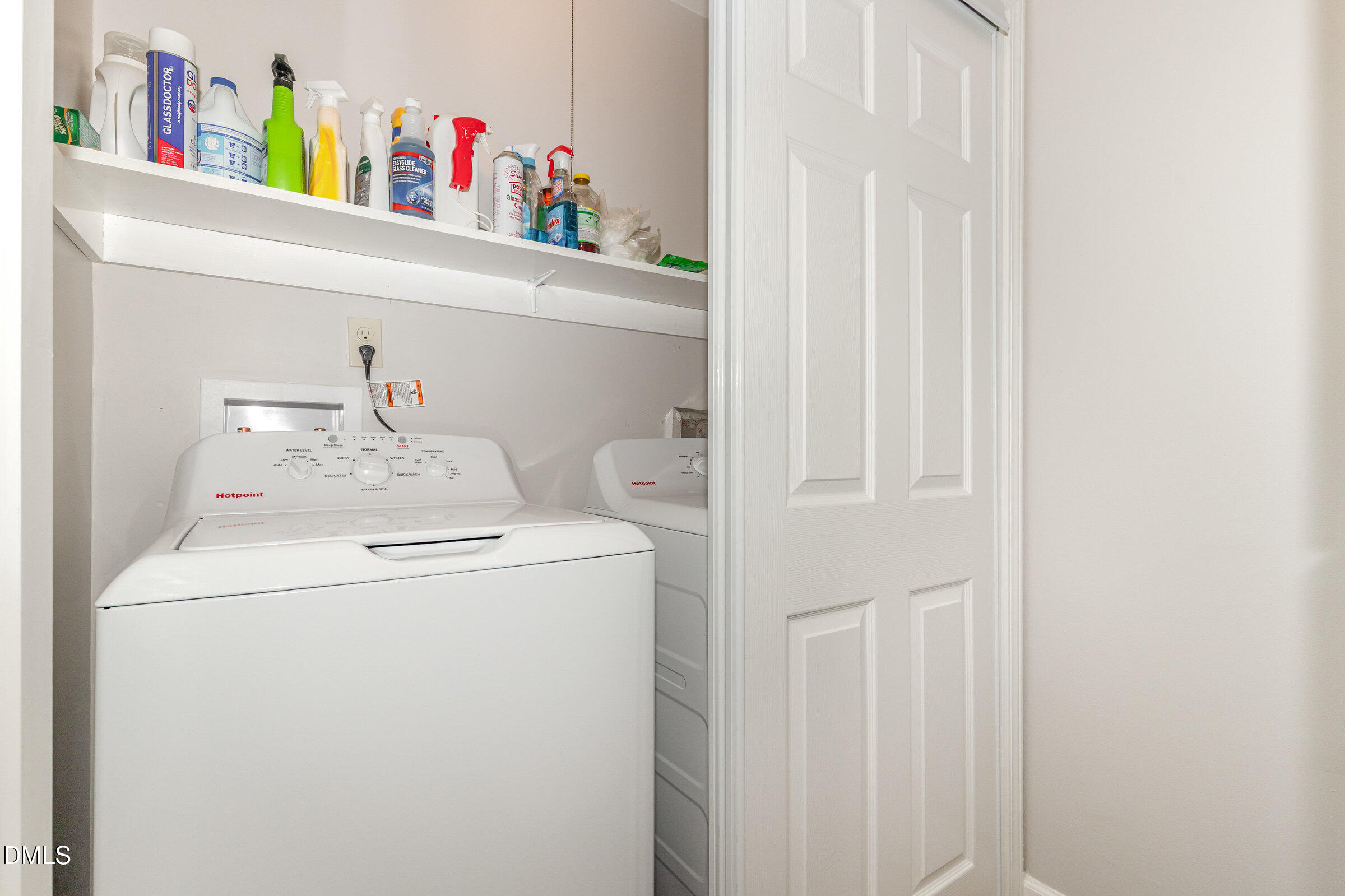 7020 Carpenter Fire Station Road Cary, NC 27519 - Photo 9 of 25 a utility room with dryer and washer