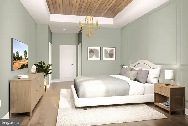a bedroom with a bed and a couch