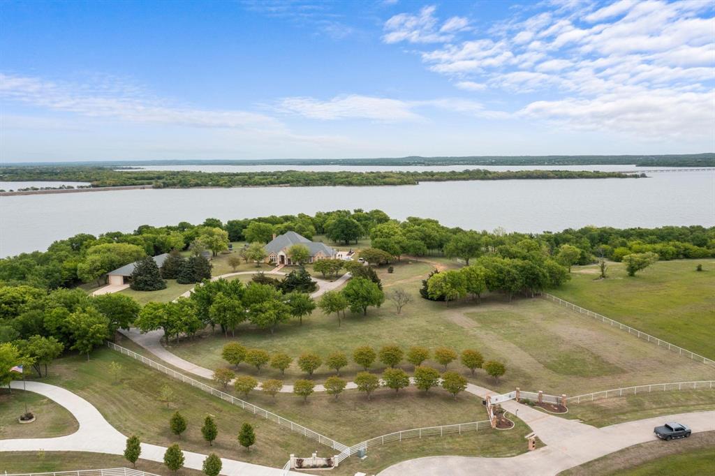 208 Highpoint Circle Valley View, TX 76272 - Photo 1 of 1 a view of a lake with outdoor space
