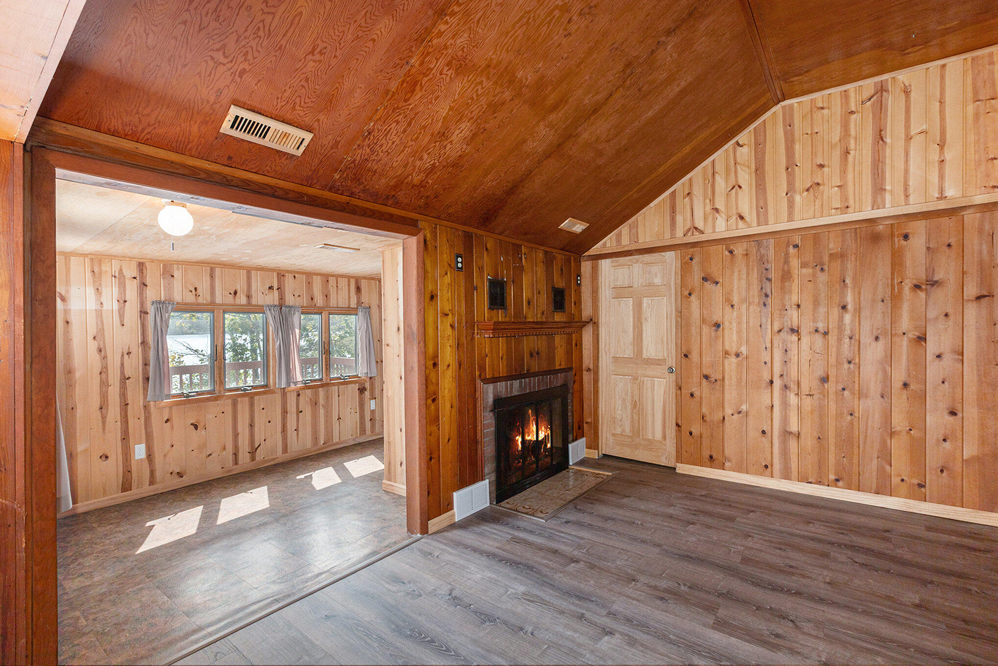 8804 Sunset Trail Road Northeast Mancelona, MI 49659 - Photo 13 of 43 Wood fireplace