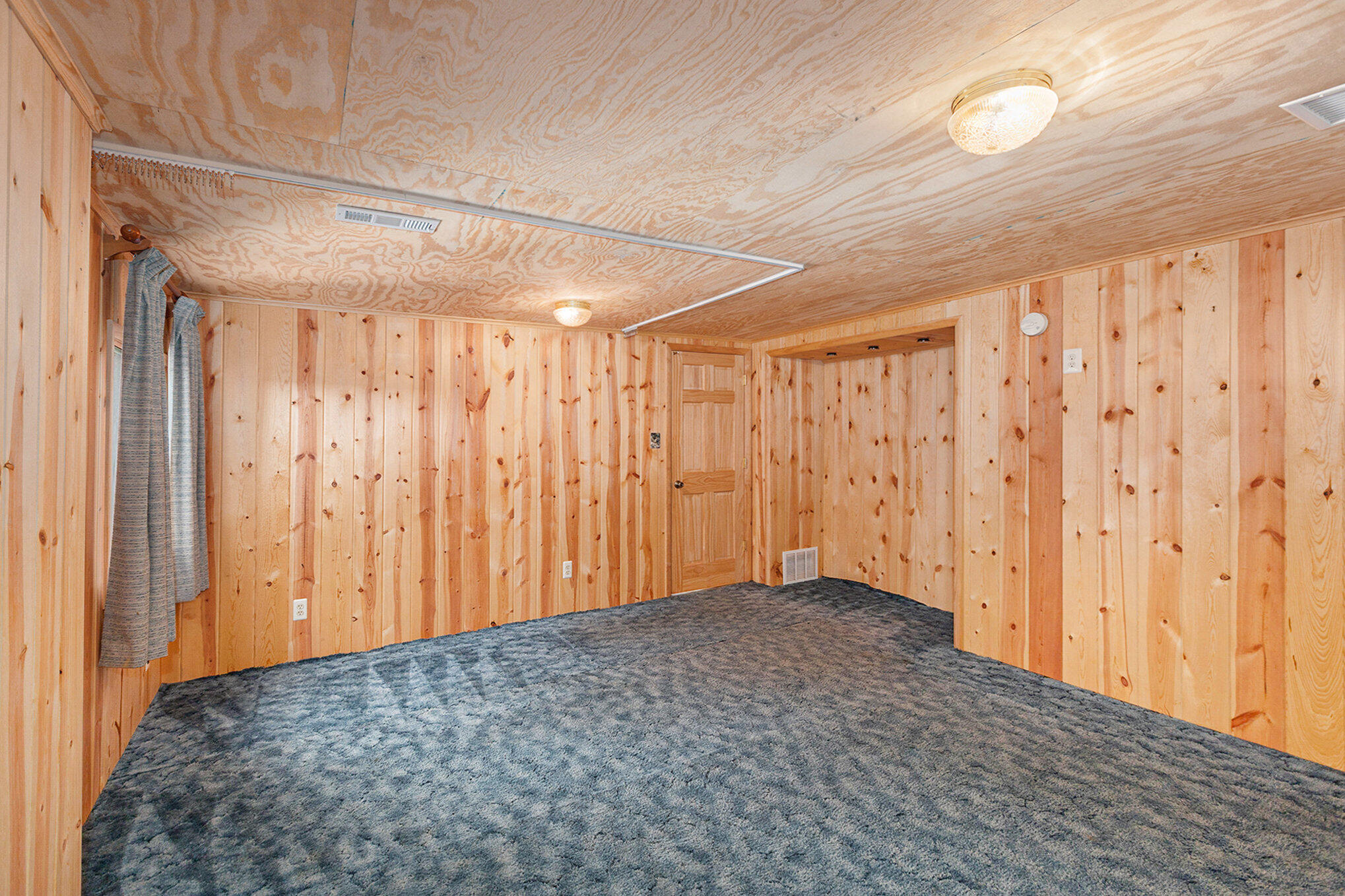 8804 Sunset Trail Road Northeast Mancelona, MI 49659 - Photo 20 of 43 Primary Bedroom