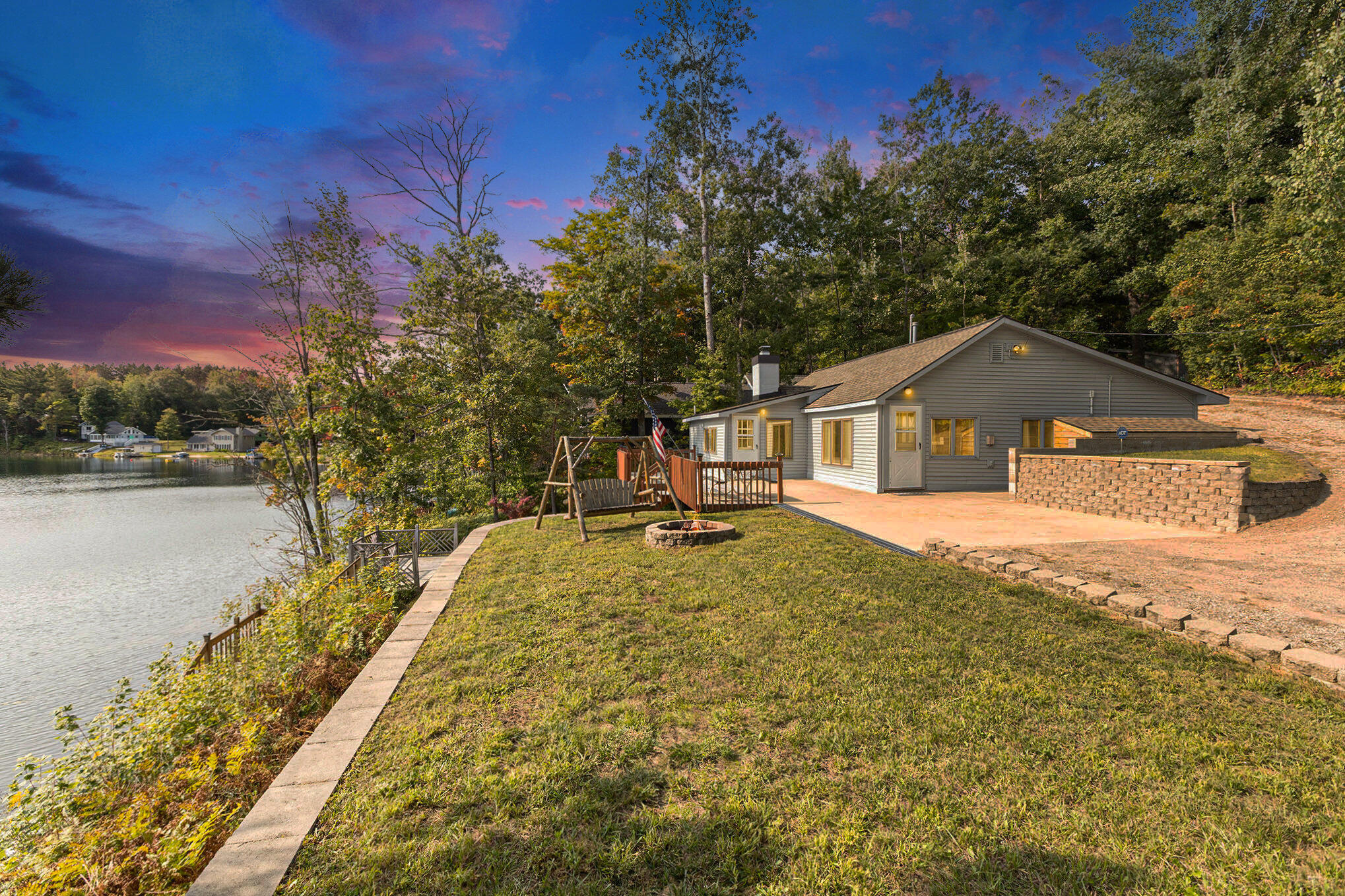 8804 Sunset Trail Road Northeast Mancelona, MI 49659 - Photo 2 of 43 Twilight