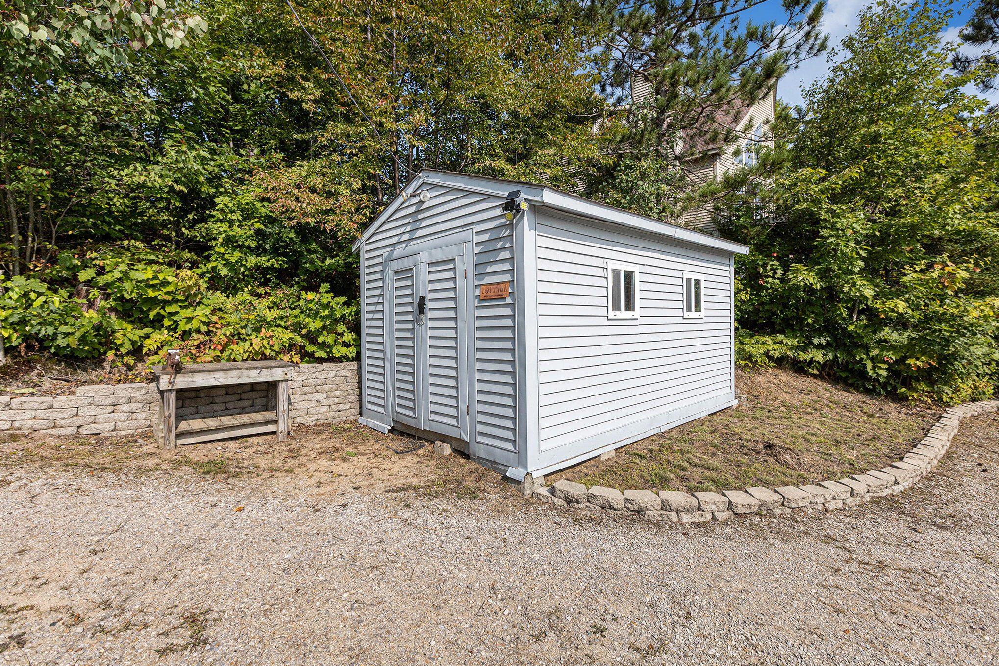 8804 Sunset Trail Road Northeast Mancelona, MI 49659 - Photo 34 of 43 Storage shed