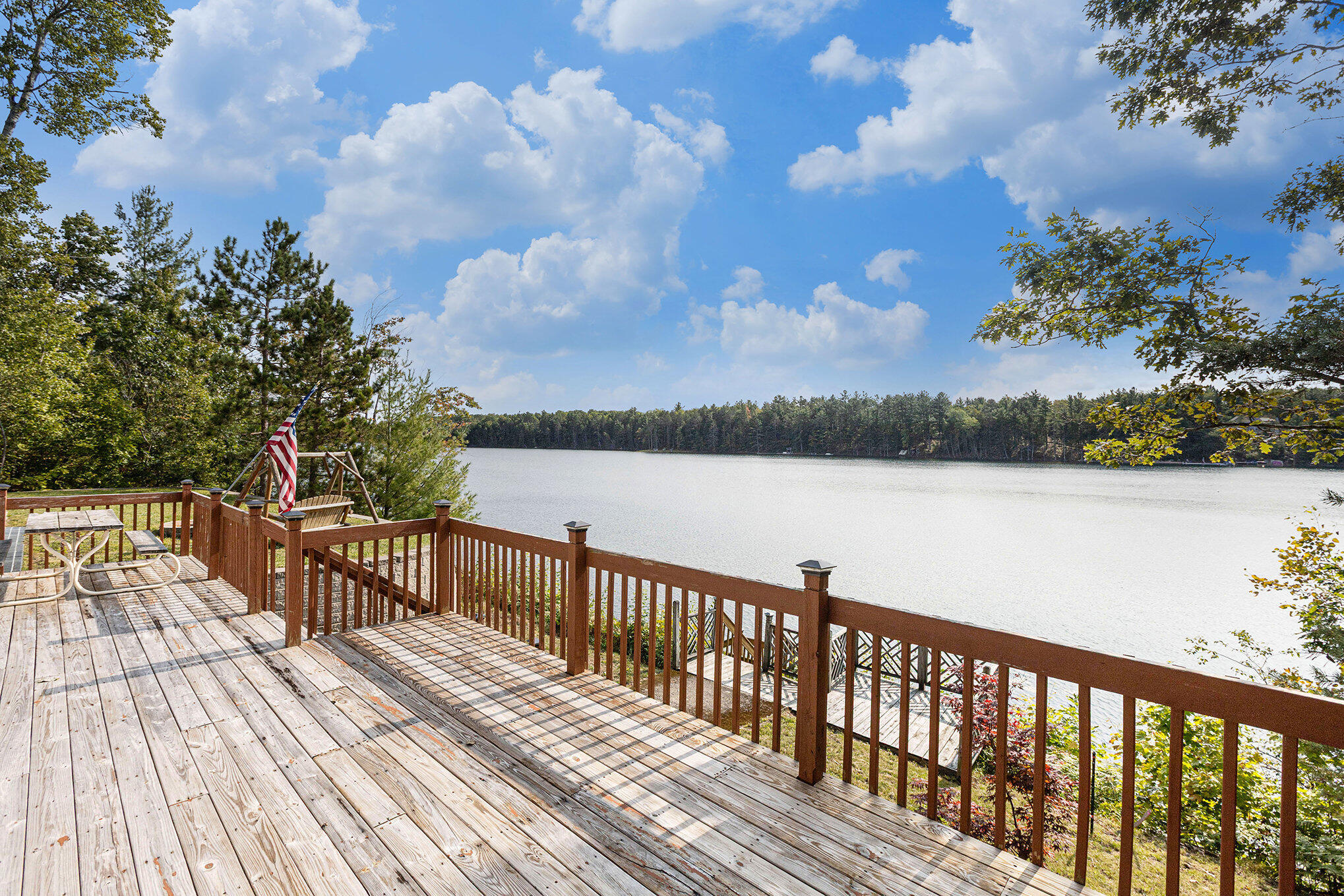 8804 Sunset Trail Road Northeast Mancelona, MI 49659 - Photo 4 of 43 Large deck