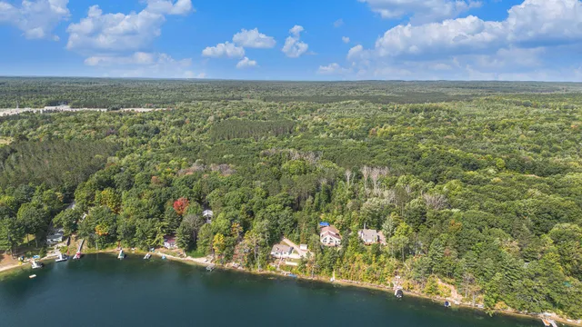 $569,000 | 8804 Sunset Trail Road Northeast, Mancelona, MI 49659