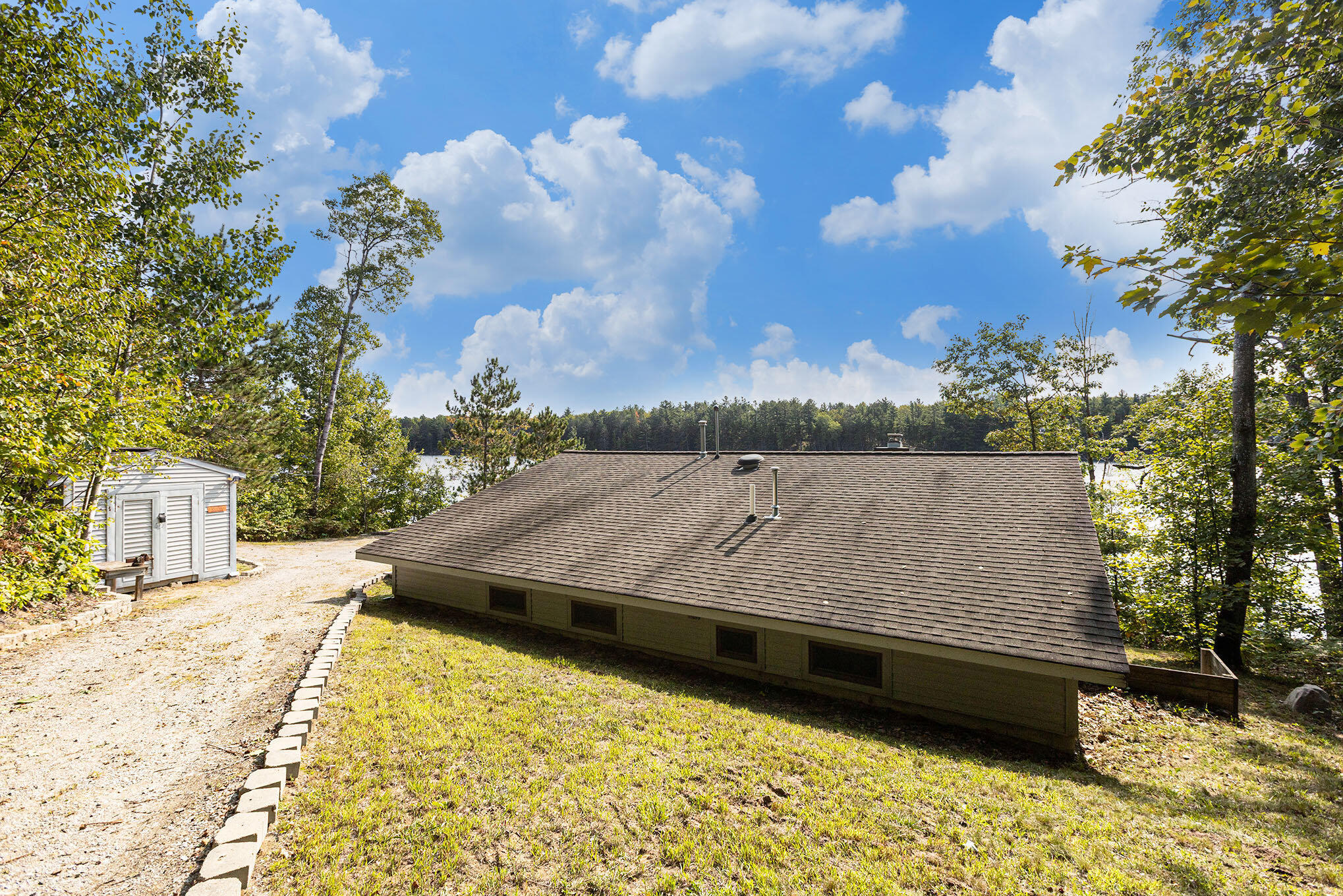 8804 Sunset Trail Road Northeast Mancelona, MI 49659 - Photo 7 of 43 Back view