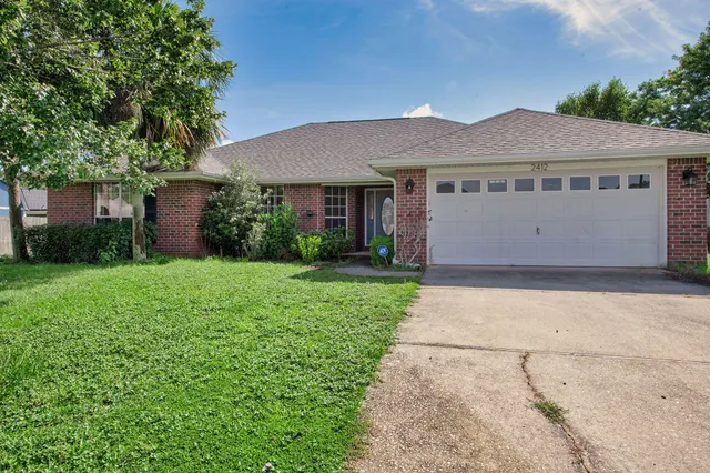 front view of house with a yard