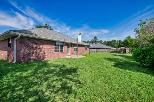a view of a backyard with a garden
