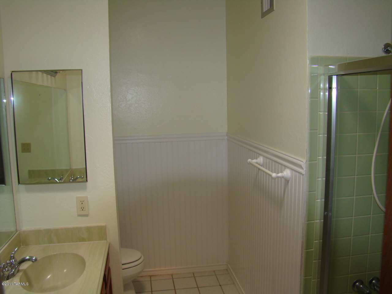 1443 North Rio-Aros Green Valley, AZ 85614 - Photo 11 of 19 a bathroom with a granite countertop sink toilet and shower