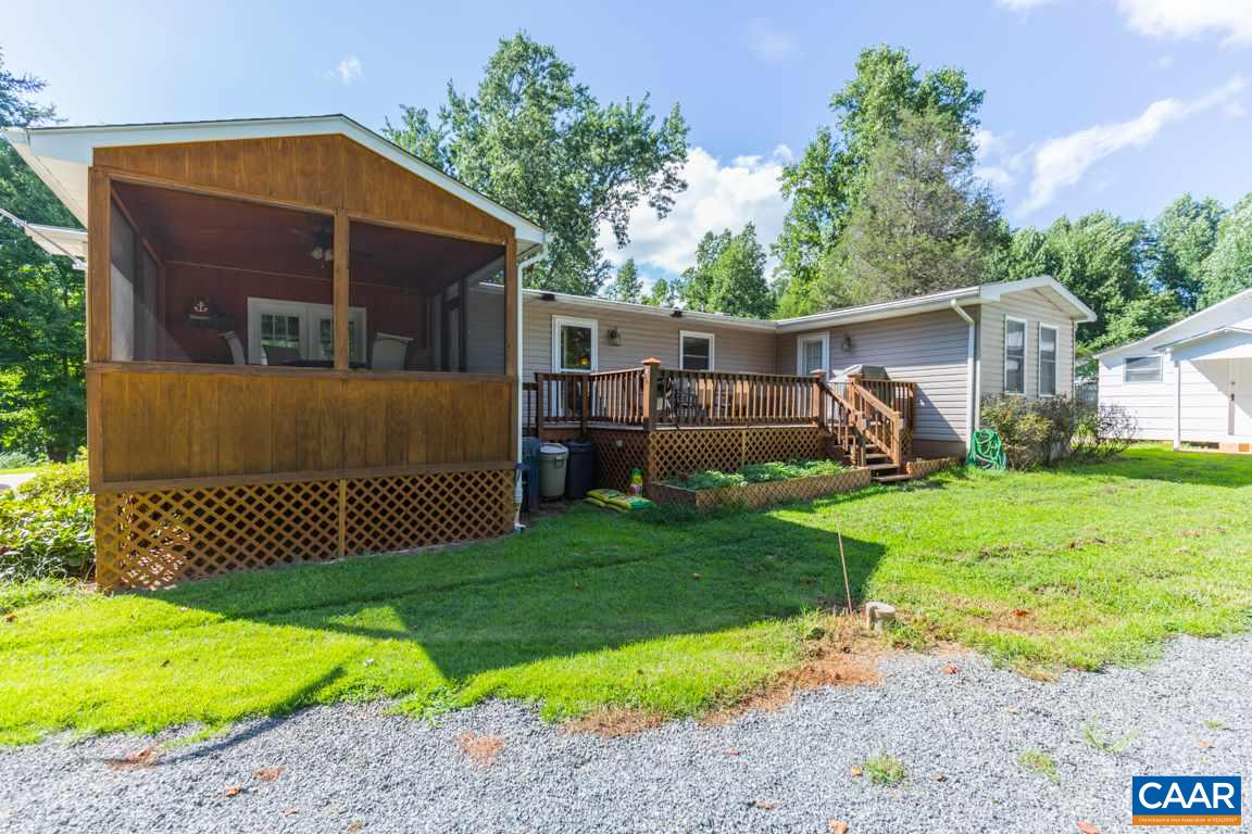 167 Westview Road Ruckersville, VA 22968 - Photo 35 of 50 a front view of a house with garden