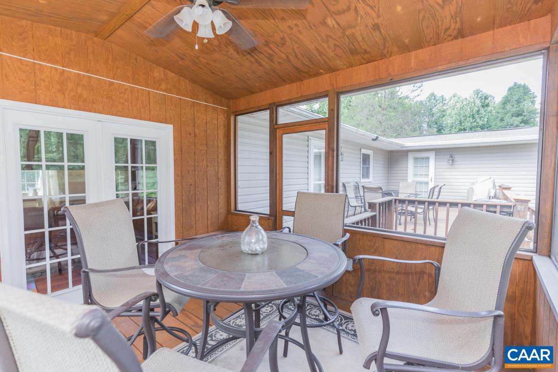 167 Westview Road Ruckersville, VA 22968 - Photo 36 of 50 a view of a dining room with furniture window and outside view