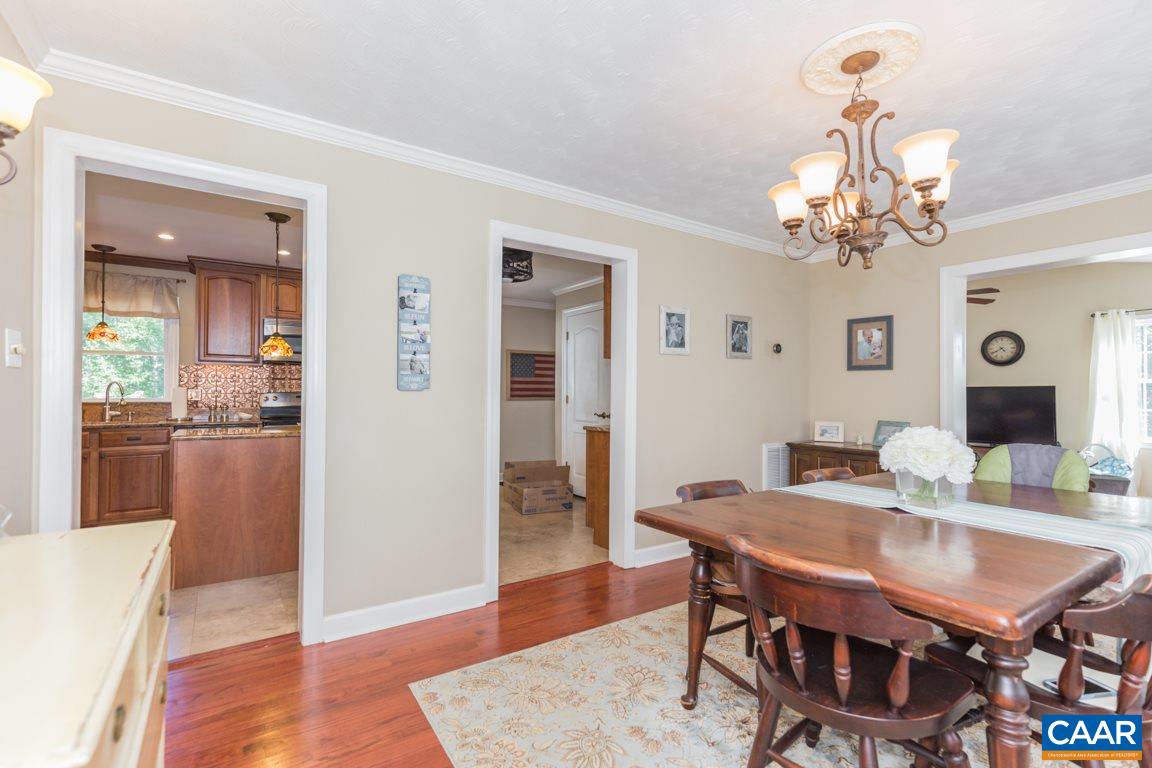 167 Westview Road Ruckersville, VA 22968 - Photo 8 of 50 a view of a dining room with furniture and wooden floor