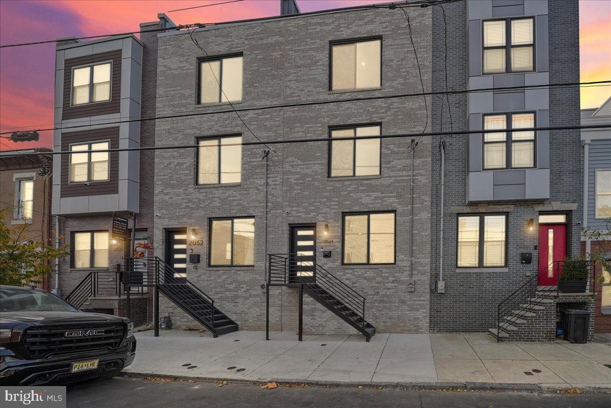 2034 Reed Street Philadelphia, PA 19146 - Photo 5 of 55 Twilight Front Exterior