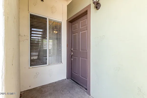 a view of a room that has a window in it
