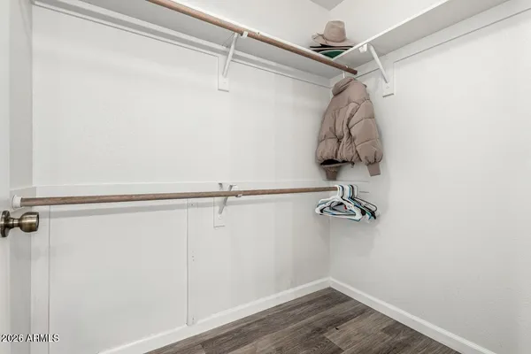 a view of a room with racks on the wall