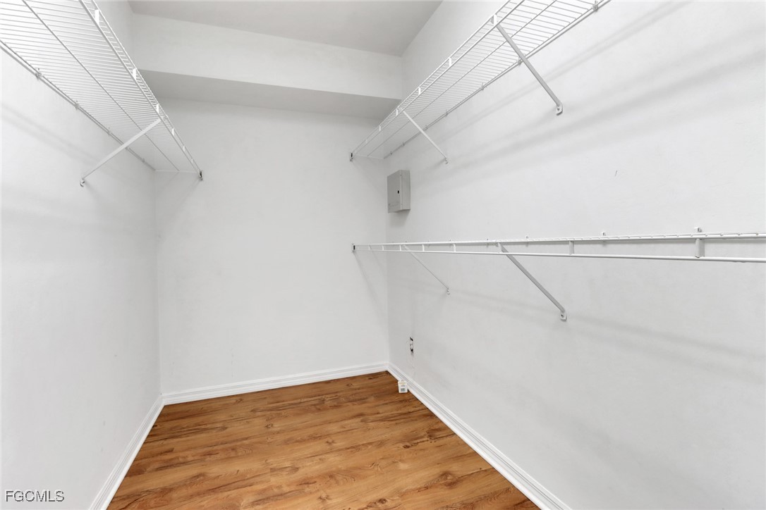 100 Siena Way, Unit 1201 Naples, FL 34119 - Photo 13 of 25 a view of a room with racks on the wall